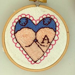Butt cross stitch